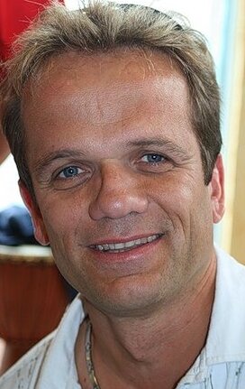 фото Андре Буше