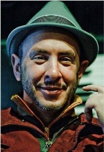 фото Сэм Холландер