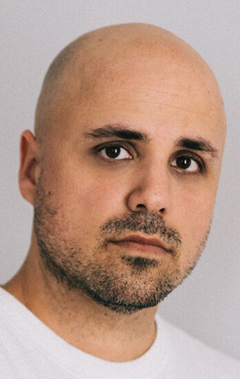 фото Адам Сигал