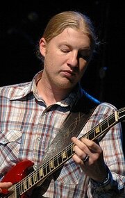 фото Дерек Тракс