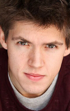 фото Джон Бэйн