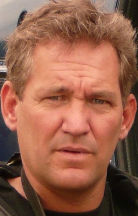 фото Крис Райан