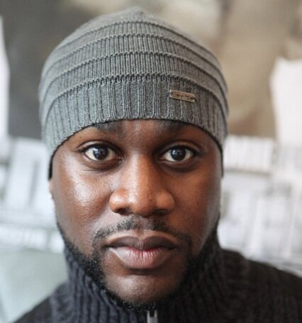 фото Майкл Амос