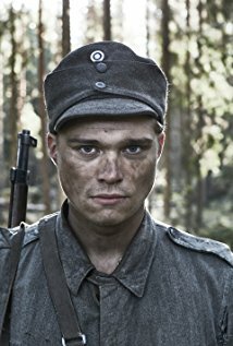 фото Аксели Коуки