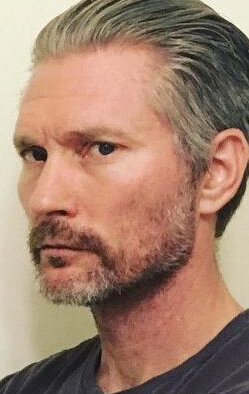 фото Трэвис Стивенс