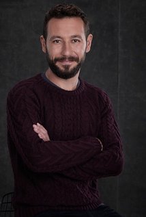 фото Окан Авджи