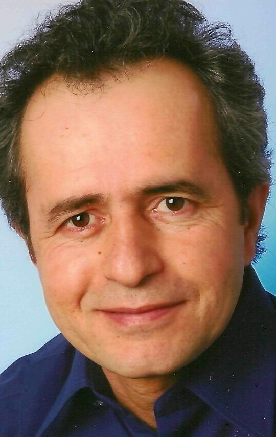 фото Муафак Рушди