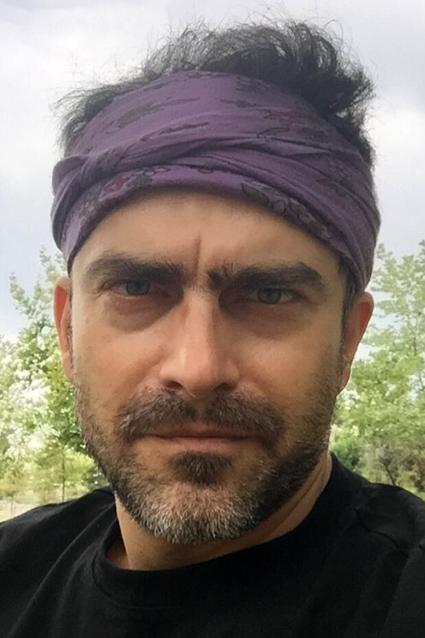 фото Tolga Iskit