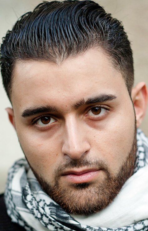 фото Хусейн Экиси