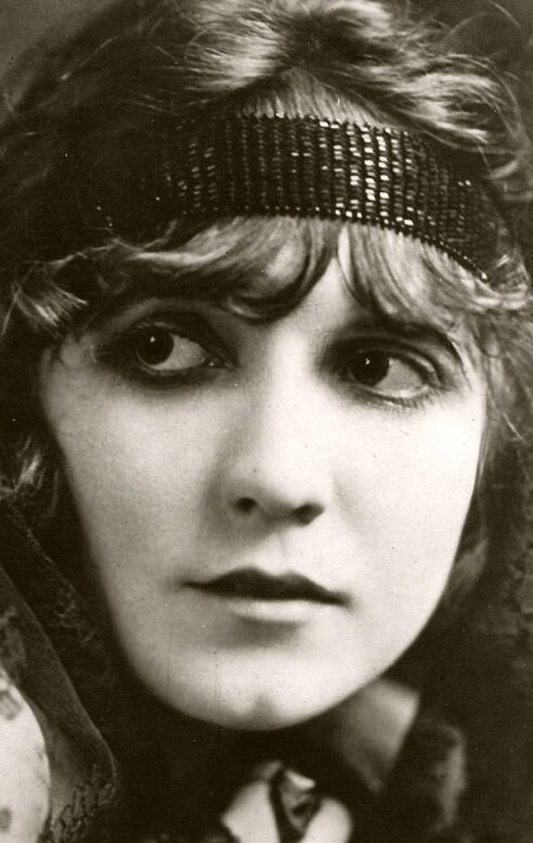 фото Луиз Глом