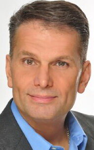 фото Томми Байиокос