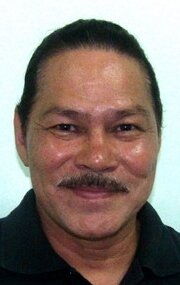 фото Арчи Адамос