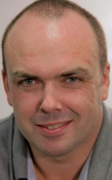 фото Майкл Макколл