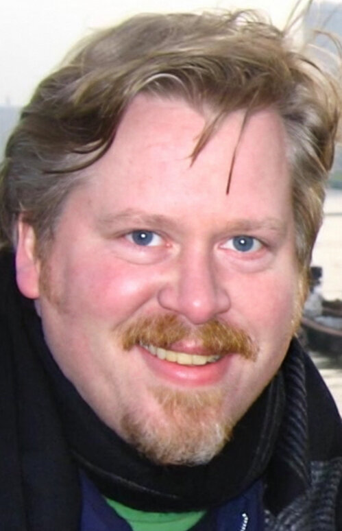 фото Том Ходжис