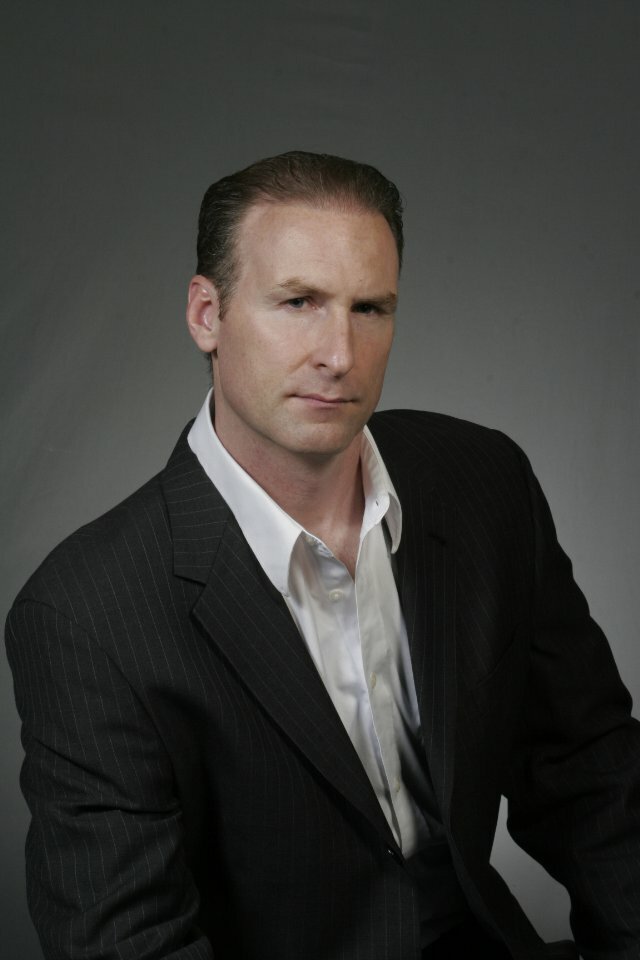 фото Джон Дж. Шнайдер