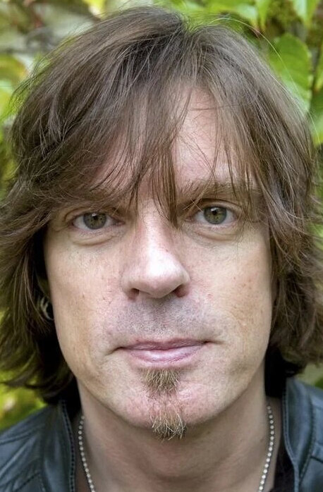 фото Джон Левен