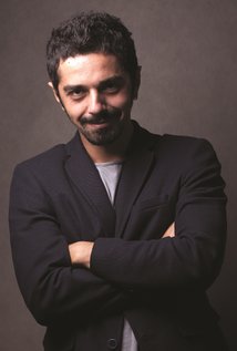 фото Амос Захария