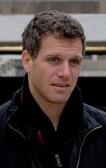 фото Адам Кассен