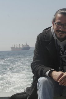 фото Толга Карачелик