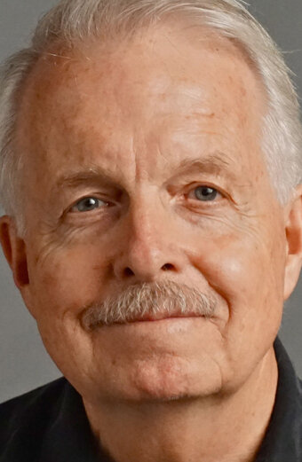 фото Томас Э. Экермен