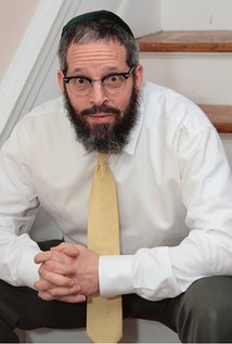 фото Реувин Расселл