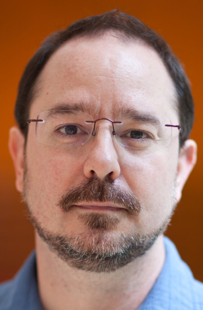 фото Джон Скальци