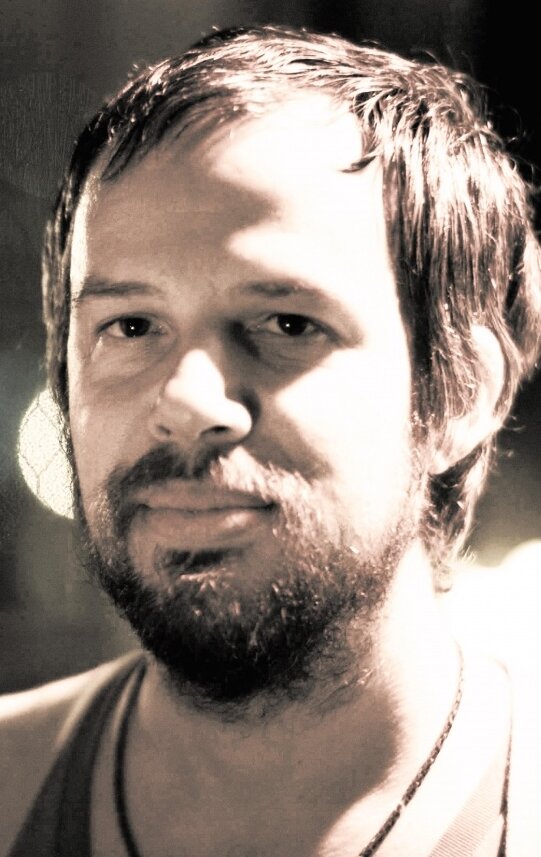 фото Адам Уилци