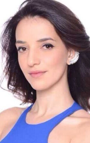 фото Люси Ахариш