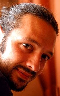 фото Эрхан Козан