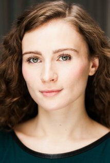 фото Эмили Такер