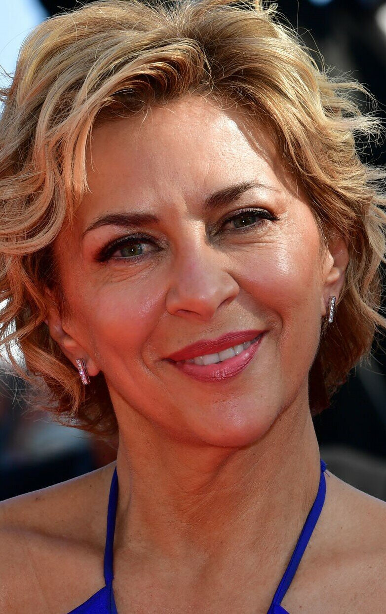 фото Корина Тузе