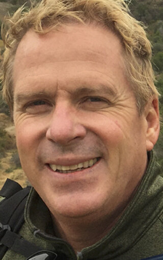 фото Пол Холахан