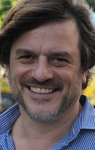 фото Николас Саймон