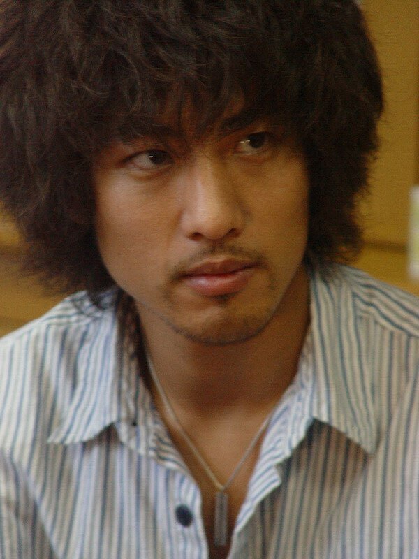 фото Хироёси Комуро