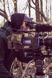 фото Адам Минник