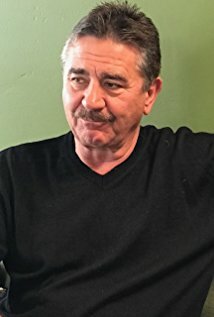 фото Лу Комиси