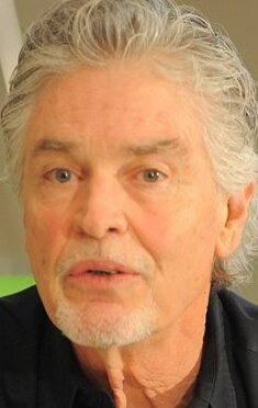 фото Чак Комиски