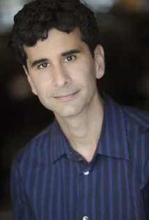 фото Джон Кариани