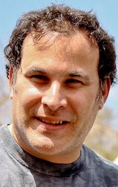 фото Грег Вульф