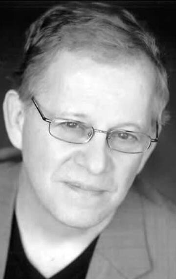 фото Рон Томас