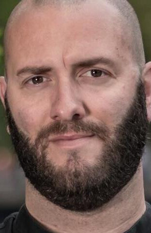 фото Адам Дж. Морган