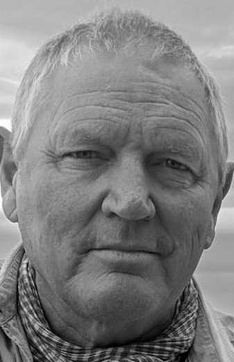 фото Роджер Скоулс