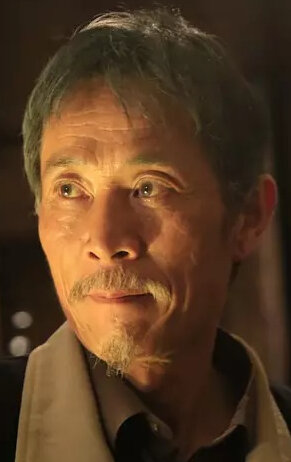 фото Хуан Цзинъи