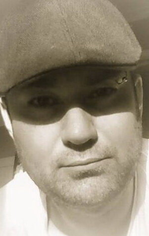 фото Майк Д. Холден