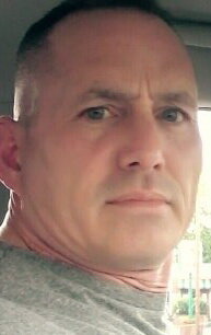 фото Крис Твоми