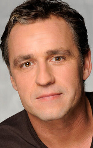 фото Крис Тейтс