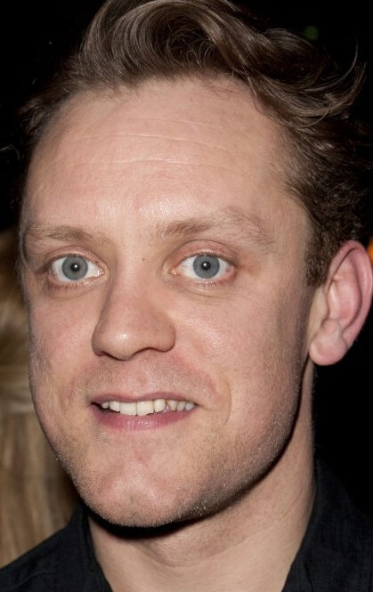 фото Сэм Тротон