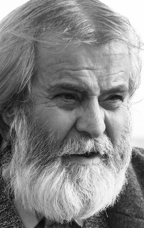 фото Тарик Акан