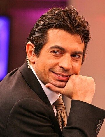 фото Окан Байулген