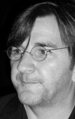 фото Норман Корбей